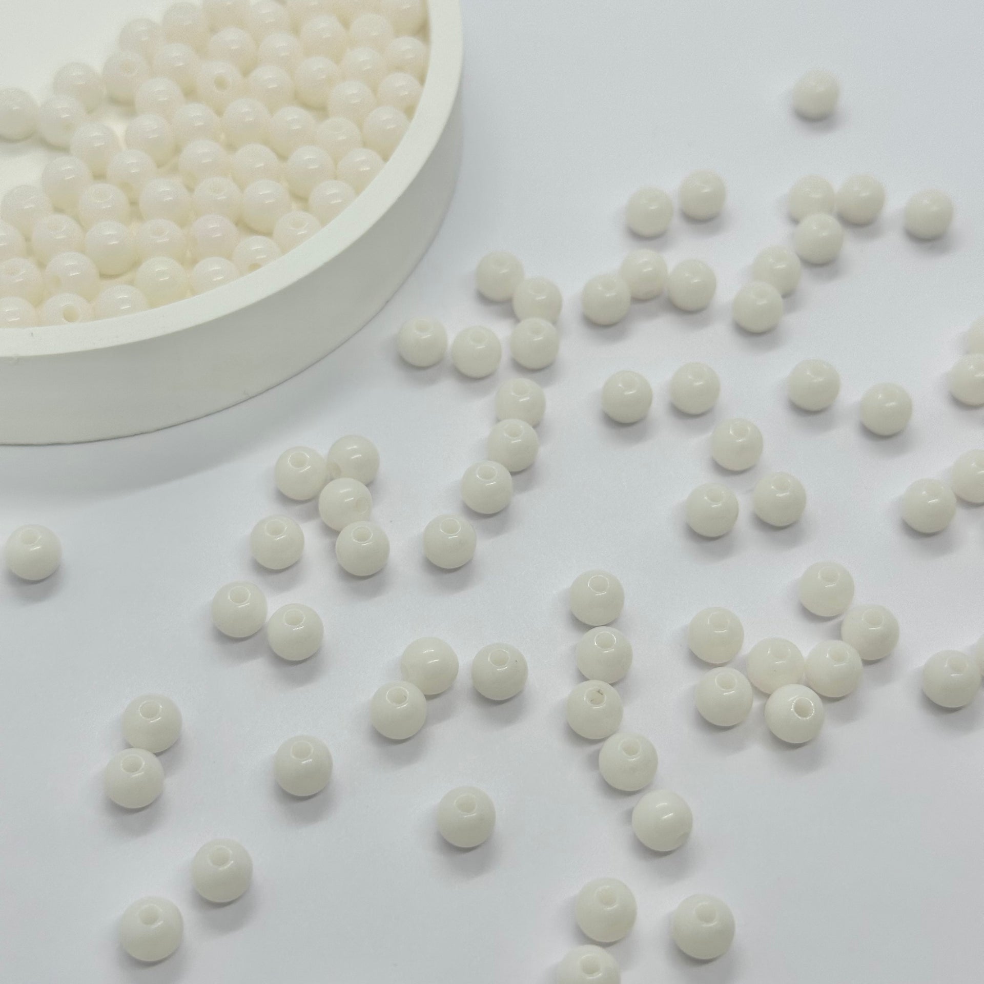 Perline acriliche: sfera pastello da 6 mm (trasparente)